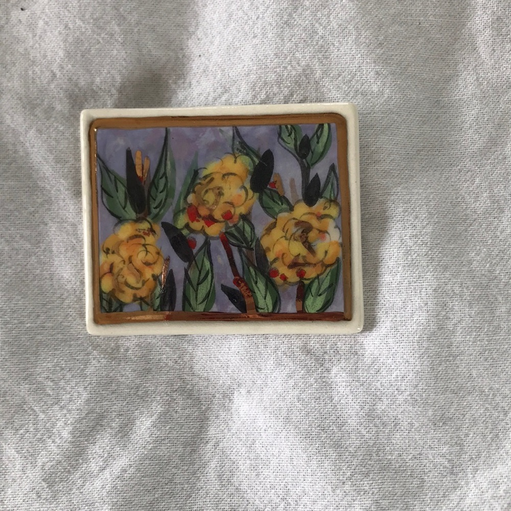 Laura Mostaghel Hans painted brooch